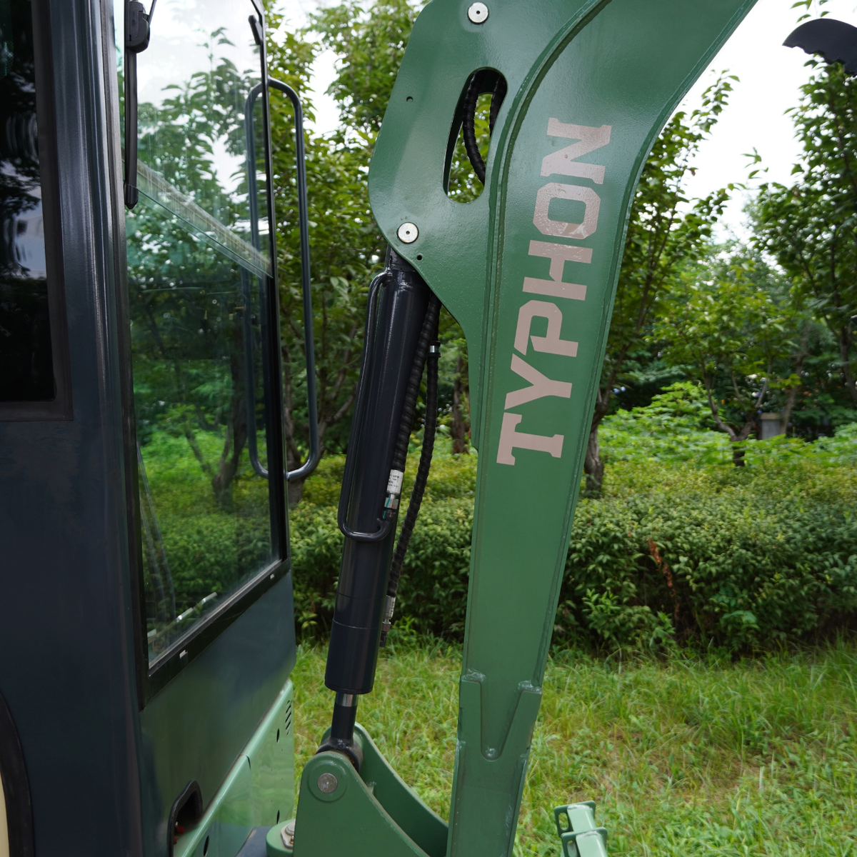 TYPHON KUVOU 2.7 - 5,300 lb Mini Excavator with Kubota D1105, Enclosed A/C & Heater Cab, Retractable Metal Tracks & Full Pilot Controls - New Excavator For Sale