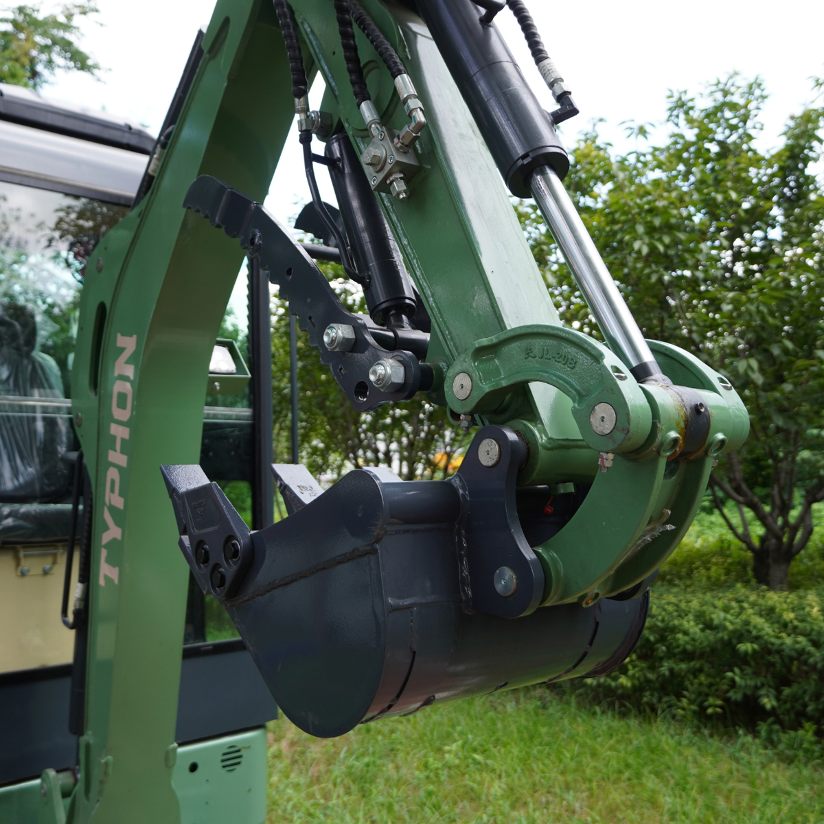 TYPHON KUVOU 2.7 - 5,300 lb Mini Excavator with Kubota D1105, Enclosed A/C & Heater Cab, Retractable Metal Tracks & Full Pilot Controls - New Excavator For Sale